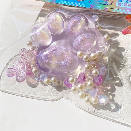light purple rinbow glow kitten paw squishy toys